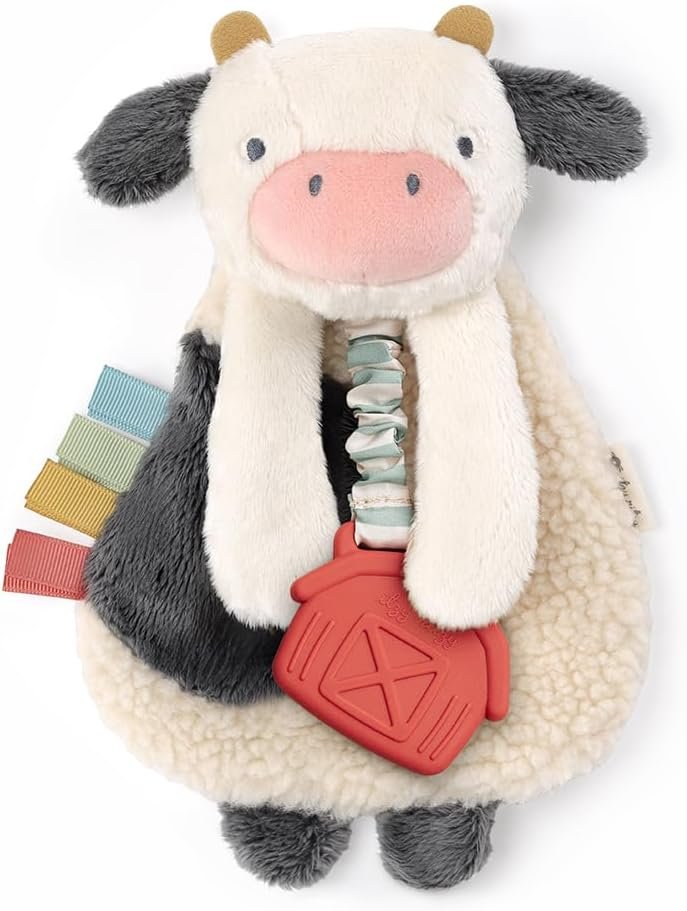 Itzy Ritzy – Itzy Lovey Including Teether – Baby Lovey with Teether, Textured Ribbons & Dangle Arms – Features Crinkle Sound, Sherpa Fabric and Minky Plush (Cow)