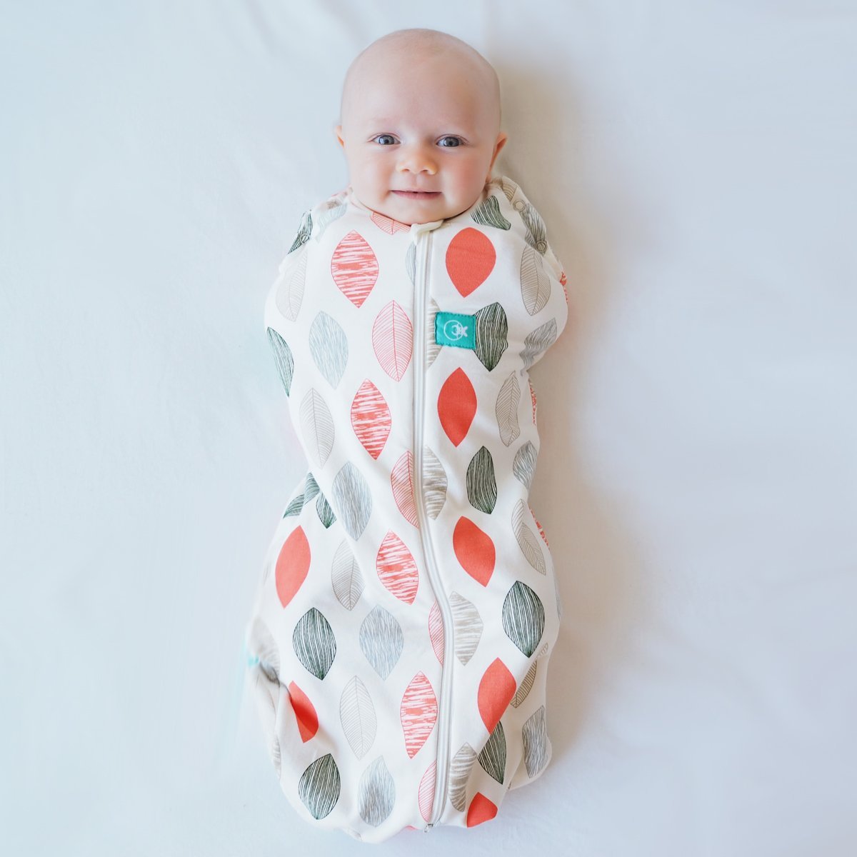 ergoPouch Cocoon Swaddle Sack 0.2 TOG – Baby Sleep Sack, Gentle Snug Fit Helps Calm Startle Reflex, Ideal for Arms In/Out Sleeping, Soft Breathable Fabric for Better Sleep (0-3 Months, Blush Leaf)