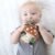 Itzy Ritzy Infant Toy & Teether – Itzy Pal Baby Teething Toy Includes Lovey, Crinkle Sound, Textured Ribbons & Silicone Teether Toy for Newborn (Mushroom)