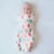 ergoPouch Cocoon Swaddle Sack 0.2 TOG – Baby Sleep Sack, Gentle Snug Fit Helps Calm Startle Reflex, Ideal for Arms In/Out Sleeping, Soft Breathable Fabric for Better Sleep (0-3 Months, Blush Leaf)